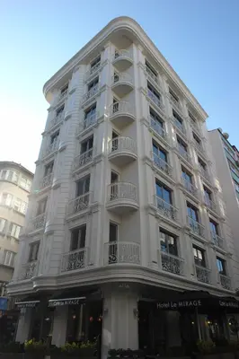 a large white building with balconies on it at Hotel Le Mirage in Istanbul