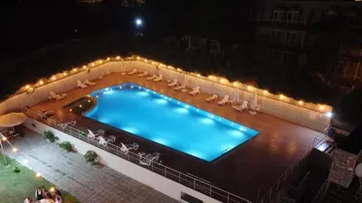 an overhead view of a swimming pool at night at TALEN OTEL in Istanbul