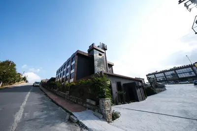 a building sitting on the side of a street at Luxon Hotel Sakarya in Sakarya