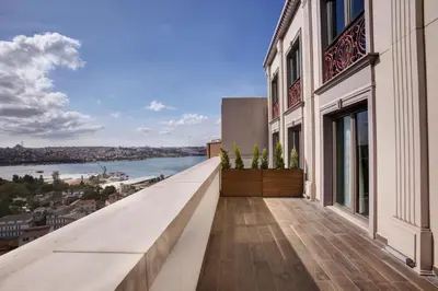 a balcony with a view of the water at Dora Pera Hotel in Istanbul