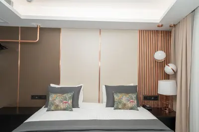 a bedroom with a large bed with two pillows at Fama Karaköy in Istanbul
