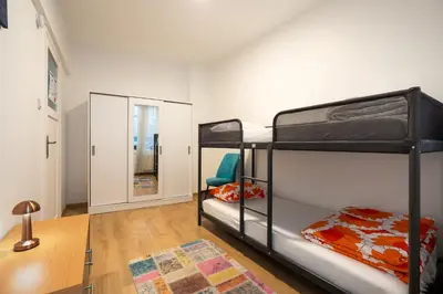 a room with two bunk beds and a mirror at Altiyol Boga, Center of Kadıköy in Istanbul