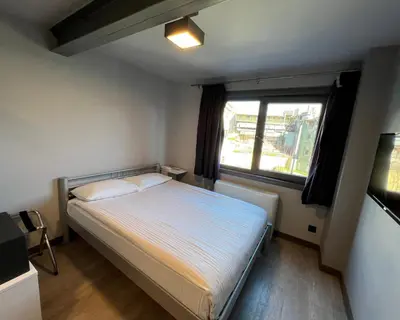 a small bedroom with a bed and a window at Eresin Hotels Express in Istanbul