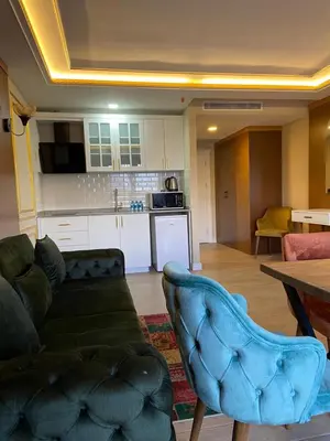 a living room with a couch and a table at Ak residence in Istanbul