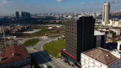 an aerial view of a city with a tall building at SERENİTY COMFORT Hotel in Istanbul