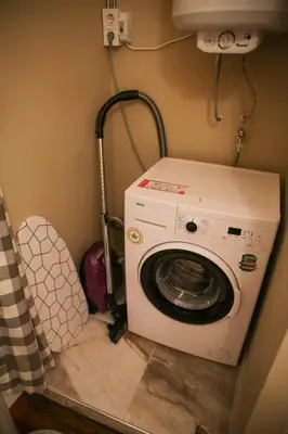 a washer and dryer in a small room with at Agus Flats Galata in Istanbul