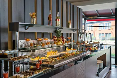 a buffet line with many different types of food at Crowne Plaza Istanbul Tuzla Viaport Marina by IHG in Istanbul