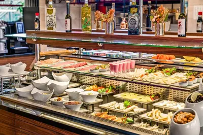 a buffet line with many different types of food at Crowne Plaza Istanbul Tuzla Viaport Marina by IHG in Istanbul