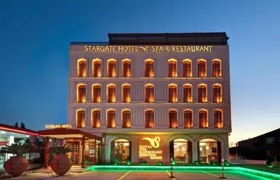 a building with a sign on the side of it at Stargate Hotel&Spa in Korfez