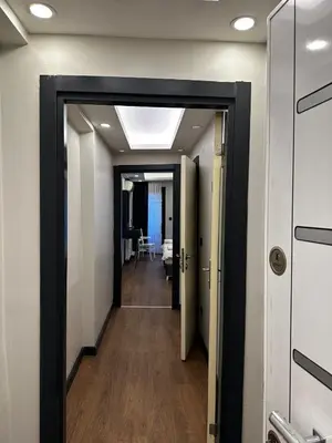 a hallway with a door leading to a room at Galata King Suites in Istanbul