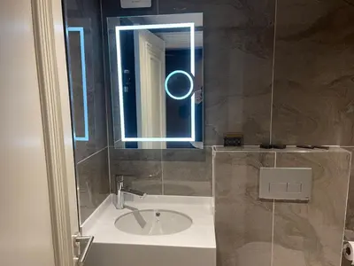 a bathroom with a sink and a mirror at The Biancho Hotel Old City - Special Category in Istanbul