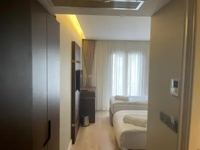 a hotel room with two beds and a window at The Biancho Hotel Old City - Special Category in Istanbul