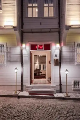 a building with a front door with lights on it at White Palace Old City Boutique Hotel in Istanbul