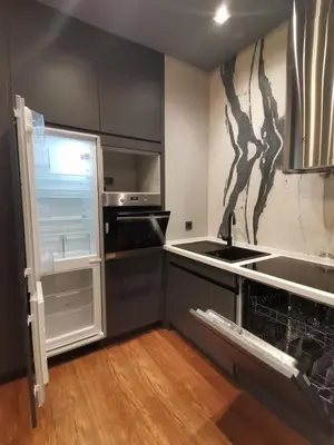 a kitchen with an open refrigerator and a sink at BENESTA BEYOGLU in Istanbul