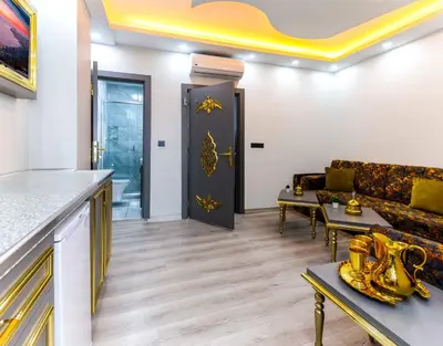 a living room with a couch and a table at Santa Rio Taxim in Istanbul
