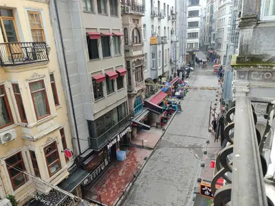 an empty street in a city with buildings at Miss City Hotel Taksim in Istanbul