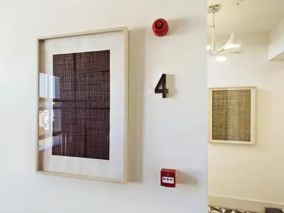 a window in a white room with a red rose at Casa Di Bava Suites by TCH in Istanbul