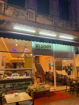 a restaurant with tables and chairs in a building at Ulusoy Old Cıty in Istanbul
