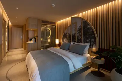 a bedroom with a large bed in a room at İnemare Hotel in Demirköy