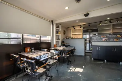 a dining room with tables and chairs in a restaurant at York House İstanbul in Istanbul
