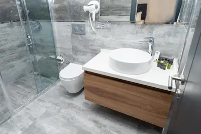 a bathroom with a sink and a shower and a toilet at Business Life Hotel & SPA Bakırköy in Istanbul