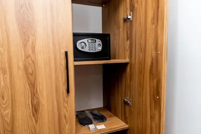 a cabinet with a radio in it in a room at Business Life Hotel & SPA Bakırköy in Istanbul