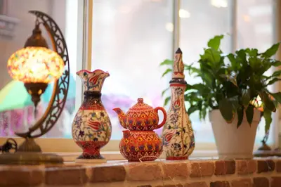 a group of vases sitting on a window sill at La Vida Old City Hotel in Istanbul