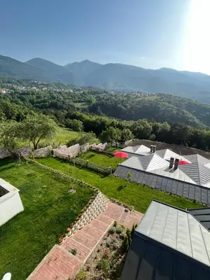 an aerial view of a house with a garden at Masklavi in Kestel
