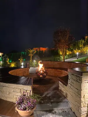 a fire pit in a garden at night at Kartepe Panorama in Kartepe