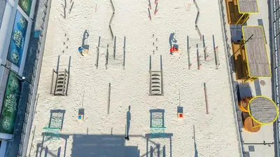 an aerial view of a building with a playground at Mola İstanbul in Silivri