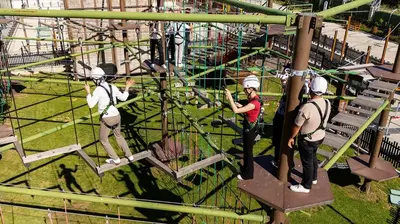 a group of people on a ropes course at a park at Mola İstanbul in Silivri