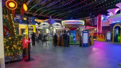 a room with people walking around in a mall at Mola İstanbul in Silivri