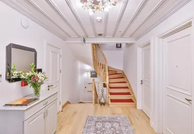 a staircase in a white room with a white ceiling at 9 Doors Hotel in Istanbul