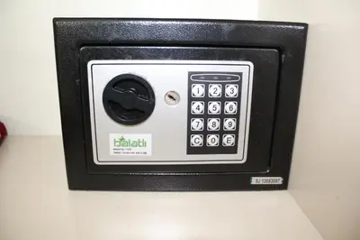 a black and white remote control on a wall at Hotel Falcon in Istanbul