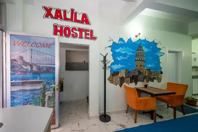 a restaurant with a sign that reads killea hospital at XALİLA HOSTEL & CAFE, MEN's ROOM, BEST IN ISTANBUL , in Istanbul