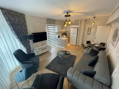 an aerial view of a living room with a couch and chairs at King Suite AE4 in Istanbul