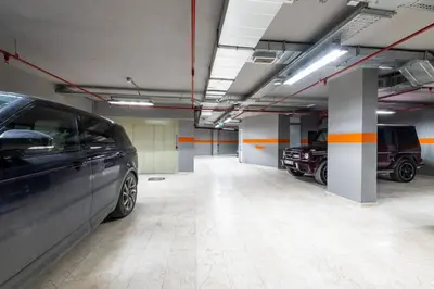 a parking garage with two cars parked in it at Aprilis Deluxe Hotel in Istanbul