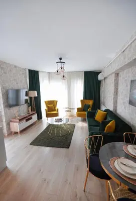 a living room with a couch and a table at King Suite BH37 in Istanbul