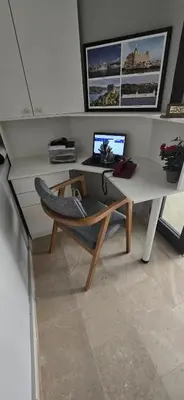 a desk with a chair and a computer on it at Seven Studıos Sultanahmet in Istanbul
