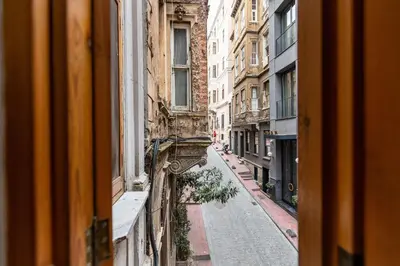 a view of an alley from a window of a building at Ganbaru Tours - Private Triplex&Duplex in Istanbul