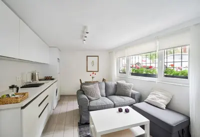 a kitchen and living room with a couch and a table at Cute Charming 1bed1bath Bebek Hidden Gem! #77 in Istanbul