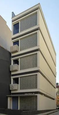 a tall white building with many windows at Brand New Central Modern Loft Smart Design! #144 in Istanbul