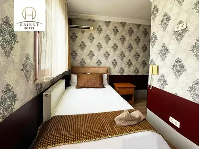 a small bedroom with a bed in a room at Orient Hotel in Istanbul