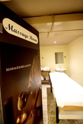 a room with a bed and a sign for a massage room at Villa Paradiso Hotel & Spa in Istanbul