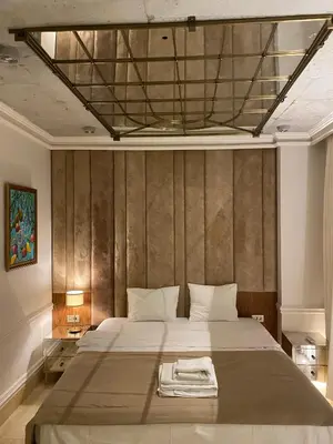 a bedroom with a large bed with a towel on it at AB Residences- Private Villa Independent in Istanbul