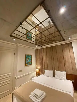 a bedroom with a bed with towels on it at AB Residences- Private Villa Independent in Istanbul
