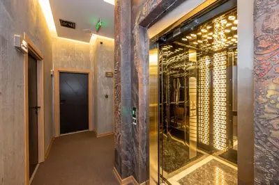 a hallway with a glass door in a building at Continental Airport Hotel in Istanbul
