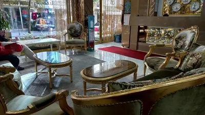 a group of chairs and tables in a store at Metrolux Hotel in Istanbul