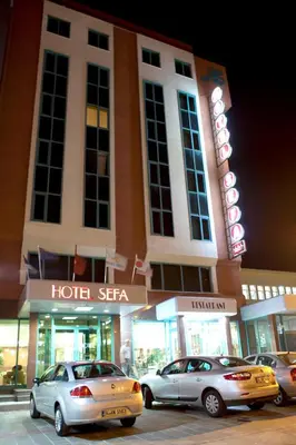 three cars parked in front of a hotel sigzar at SEFA HOTEL 1 ÇORLU in Corlu