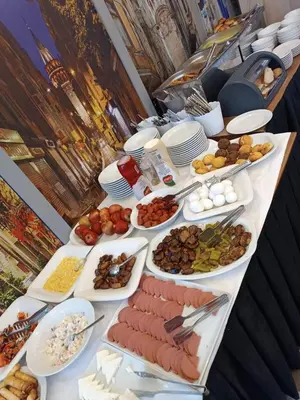 a table with many different types of food on it at Bona Sera Hotel in Istanbul